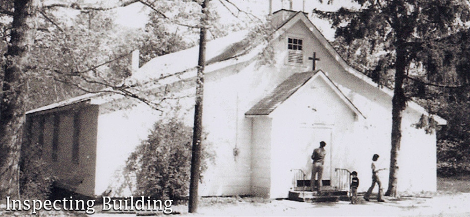 men inspecting building